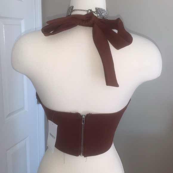 I am selling a plunging brown corset halter crop top strap ties on back neck. - Picture 3 of 5